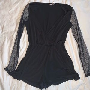 BCBG black romper with lace detail sleeves